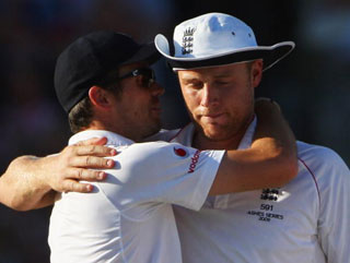 Flintoff is huhgged by James Anderson in his last-ever Test 