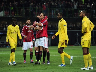 Arsenal players look forlorn as Zlatan Ibrahimovic celebrates AC Milan's fourth