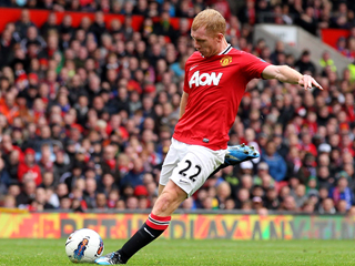 Paul Scholes netted Man United's second against ten-man QPR