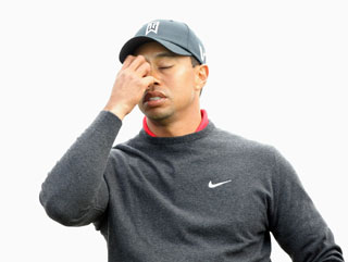 Tiger pictured not enjoying himself during the final round of the Farmers Insurance Open