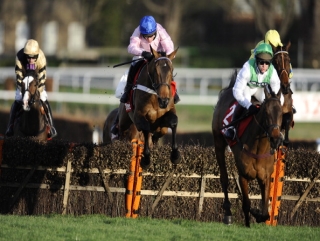 Captain Conan (pink) makes a winning British debut at Sandown.