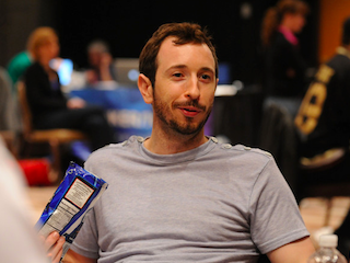 Brian Rast picking up chips at Event #55 (Photo credit: PokerNews / WSOP.com)