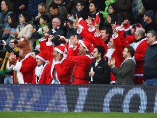 Football fans enjoy seasonal cheer