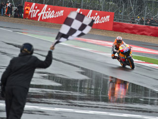 CAsey Stoner comes home first at Silverstone last time out - expect a repeat of this scene in Assen