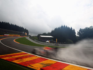 Mark Webber neatly demonstrates how wet the qualifying session was at Spa 