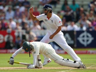 Alastair Cook celebrates the wicket of Imran Farhat - can Pakistan put more pressure on England today? 