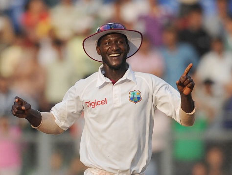 West Indies skipper Darren Sammy celebrates after his side secured a draw in a match India should really have won 