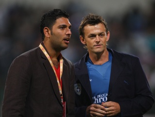 Is Adam Gilchrist (right) taking the IPL as seriously as he should be? 