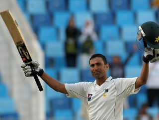 Younis Khan celebrates scoring the series' first century