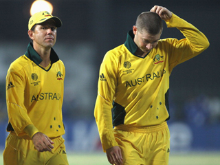 Ricky Ponting walks off knowing his last match as Aussie skipper ended in defeat after crashing ot to India in the quarter-finals 