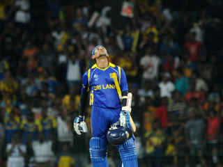 Dilshan looks up to the heavens on his way to a heavenly century 