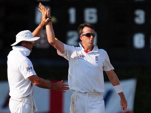 Strauss contratulates Swann after taking another wicket but the spinner will have to do it all over again 