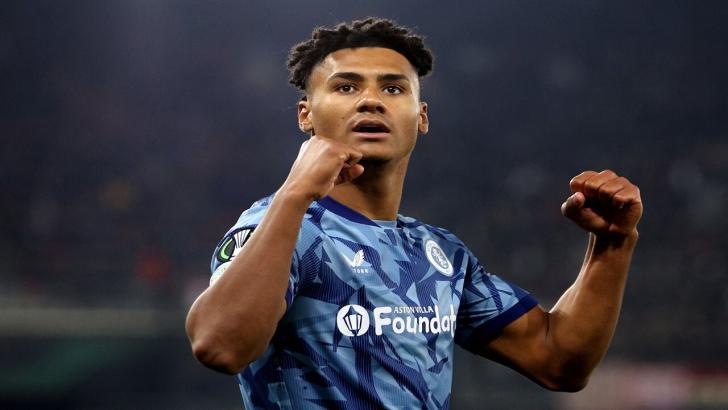 Ollie Watkins celebrates with Aston Villa fans away from home
