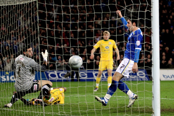 Peter Whittingham watches closely as Anthony Gardner heads the ball into his own net 
