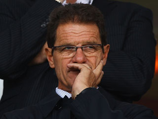  Fabio Capello ponders during the Blackpool-Fulham game this weekend