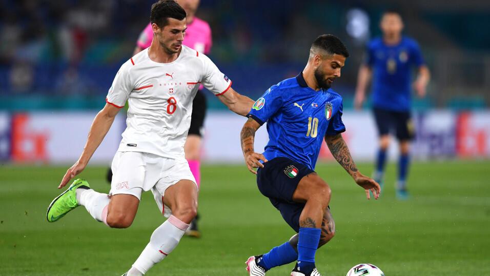 Switzerland midfielder Remo Freuler and Italy forward Lorenzo Insigne