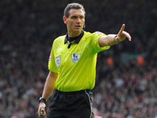 Andre Marriner was the man in charge when Manchester United visted Anfield and Jamie Carragher hauled down Michael Owen but stayed on the pitch.