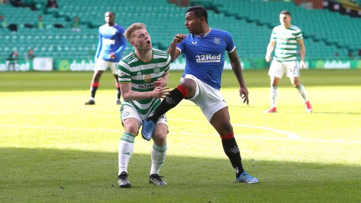 Alfred Morelos and Scott Brown playing in the Old Firm derby