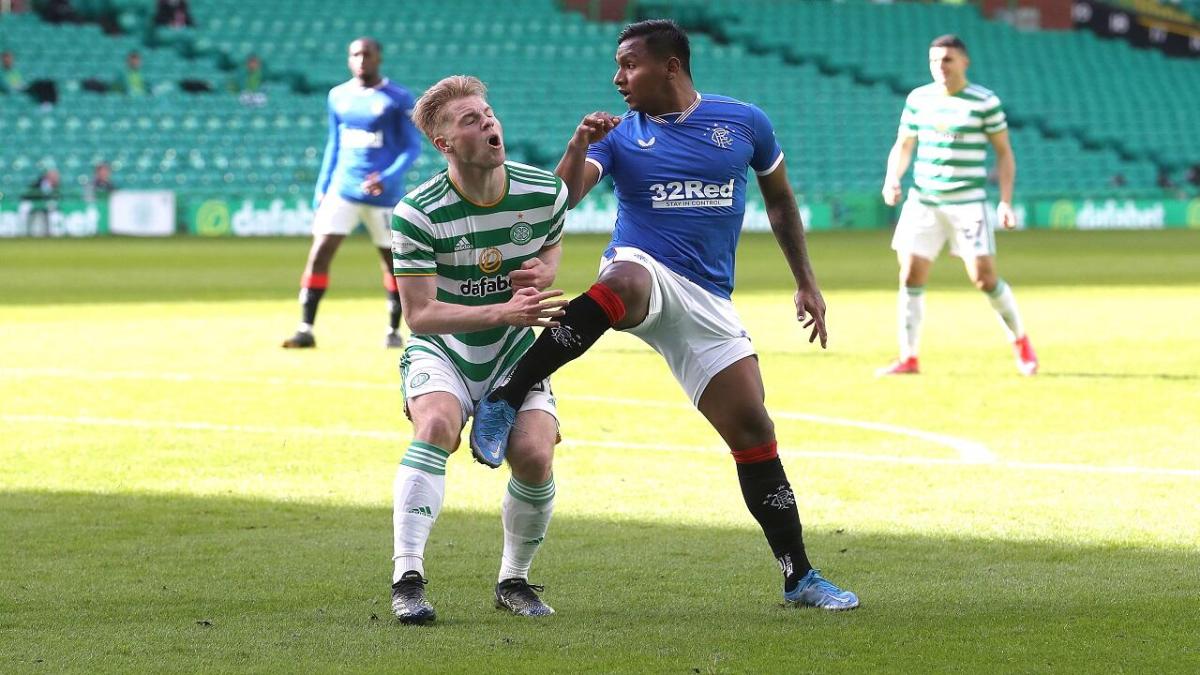 Alfred Morelos and Scott Brown playing in the Old Firm derby