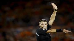 Referee blows whistle