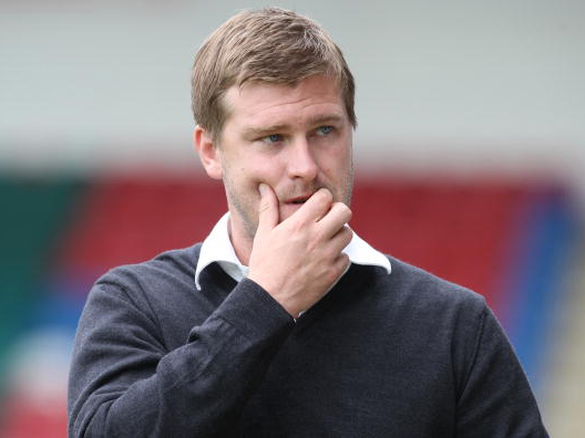 MK Dons' Karl Robinson is one of several bright young managers in this division 