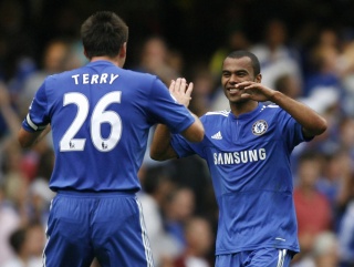 John Terry and Ashley Cole celebrate a Chelsea goal. If only they were as good with words as they are with a football at their feet  