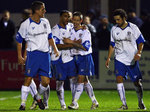 Marc Goodfellow is congratulated by his Barrow team-mates after scoring against Oxford in the FA Cup.