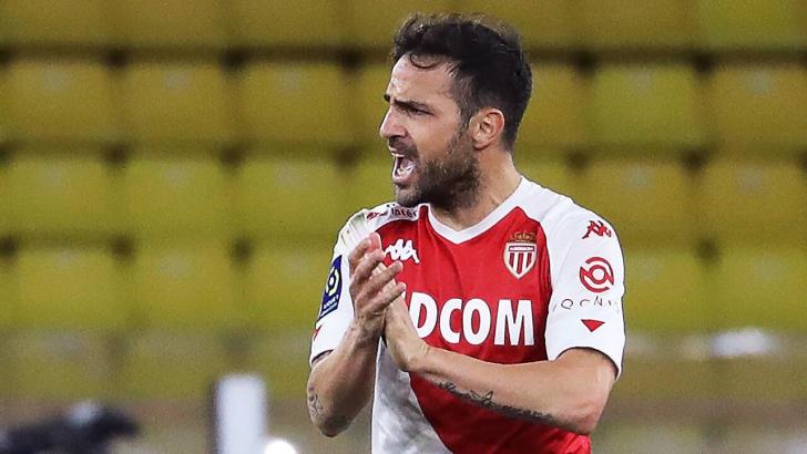 Como coach Cesc Fabregas in his playing days