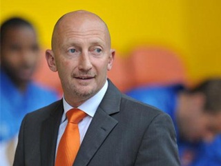 Blackpool boss Ian Holloway has his sights set on a play-off place at least