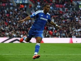Didier Drogba celebrates his stunning goal against Tottenham
