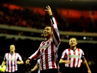 Kieran Richardson celebrates Sunderland's opening goal against Arsenal