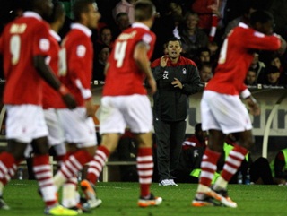 Steve Cotterill shouts instructions to his misfiring Nottm Forest side