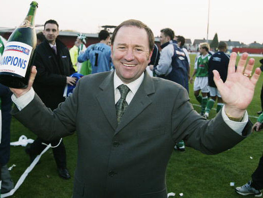 Gary Johnson celebrating promotion during his first spell back in 2003 