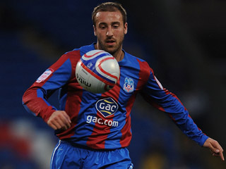 A Glenn Murray goal at Old Trafford guided Crystal Palace into the semis