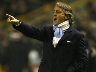 Mancini is dressed for success.