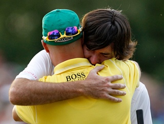 Bubba gets a hug from Ben Crane after his emotional win