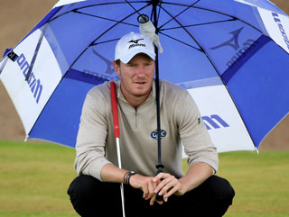 When the weather is misbehaving, Wood seems to enjoy himself