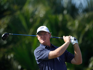 Ernie Els watches a drive at Doral 