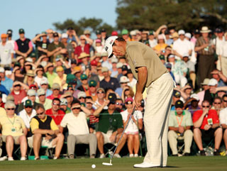 Westwood pars the 18th where he could be crowned Masters champ tonight