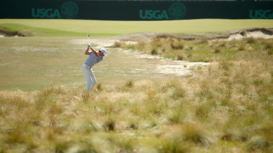 Rory McIlroy plays from the rough at Pinehurst in 2014.jpg