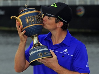 Joyous Justin with his latest trophy