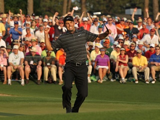 Charl Schwartzel celebrates his historical fourth birdie in-a-row on the final hole last year