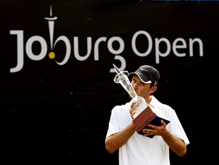 Charl Schwartzel with the Joburg Open trophy 