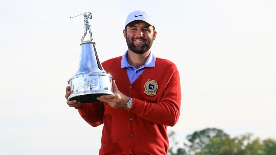 Scottie Scheffler with the API trophy.jpg