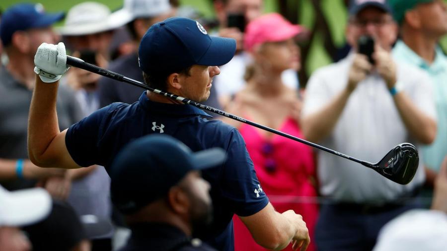Spieth at Colonail hand off club.jpg