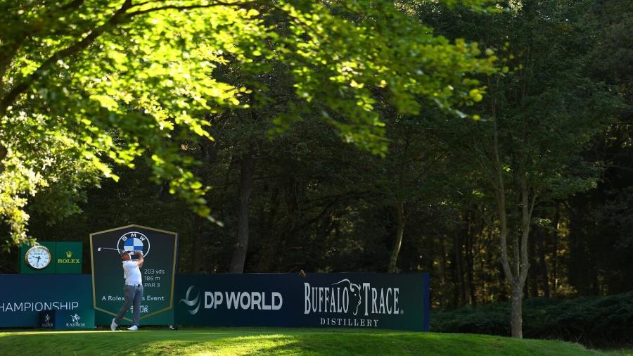 Wentworth autumnal player tees off.jpg