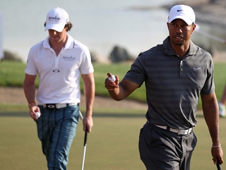 Tiger Woods, pushing clear of Rory