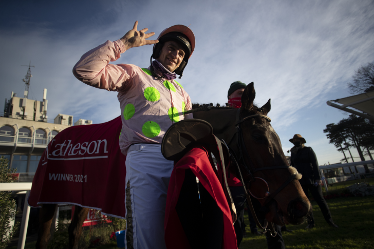 Patrick Mullins with Sharjah holding up four fingers.