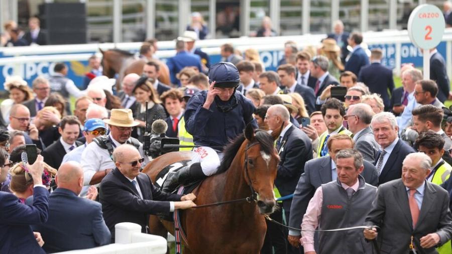 Ryan Moore celebrates Oaks on Tuesday.jpg