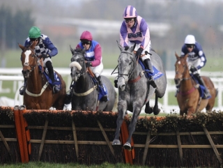 Tocca Ferro (second right) when last seen winning at Newbury.